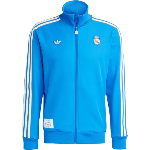 Adidas Real Madrid Terrace Icons Jacke - blau - Real Madrid Jacke im Retro-Stil, aus 100% recyceltem Polyester für hohen Tragekomfort und Bewegungsfreiheit, ideal für Stadionbesuche oder den Alltag.