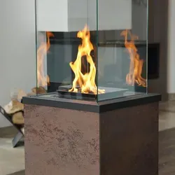 Terrassenheizer Patio Mini Quarzsinter Oxide Moro 8,2 kW - Eleganter Gasofen für Terrasse und Garten, bietet Wärme und Licht mit Sichtfeuer von 4 Seiten. Ideal für gemütliche Abende, mobil durch integrierte Rollen und sicher durch fortschrittliches Gaskontrollsystem.