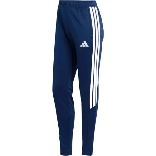 Adidas Tiro 26 League Trainingshose Regular Damen - Blau - Erlebe Komfort und Stil mit der Tiro 26 Trainingshose. Regulär geschnitten aus strapazierfähigem Material, bietet sie eine sichere Passform und praktische Reißverschlusstaschen für deine Essentials.