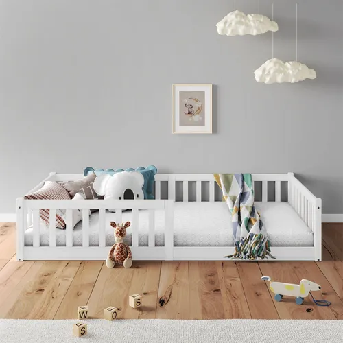Idimex Bodenbett Gustavo, Weiß, 90x190 cm aus Kiefernholz - Das bodentiefe Montessori-Kinderbett Gustavo aus FSC-zertifiziertem Kiefernholz vereint Sicherheit und Funktionalität. Ideal für selbstständiges Ein- und Aussteigen mit wechselseitigem Rausfallschutz.