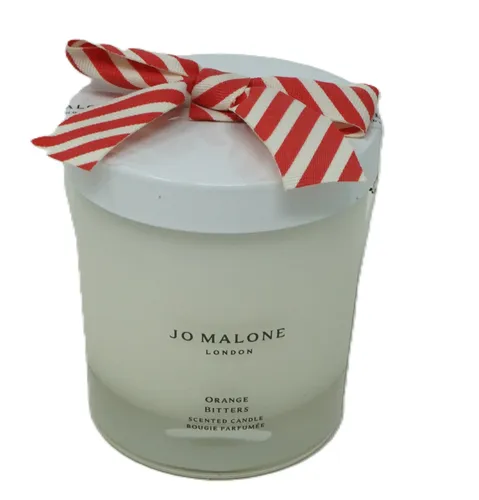 Jo Malone Orange Bitters Pomegranate Noir Duftkerze - Duftkerze von Jo Malone, 200 g, vereint die fruchtigen Aromen von Orange Bitters und Pomegranate Noir für ein luxuriöses Dufterlebnis.