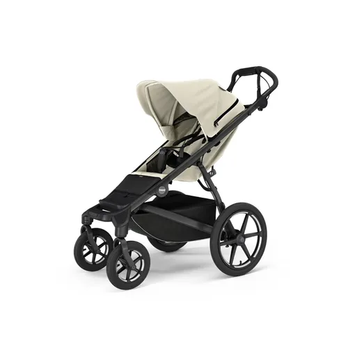 Thule Urban Glide 4-wheel Buggy - Für Jedes Terrain in Soft Beige - Fahrradanhänger mit schwenkbaren Vorderrädern und großer Wendigkeit, ideal für jedes Terrain. Bequemer Sitz und einfach zusammenklappbar für komfortable Ausflüge.