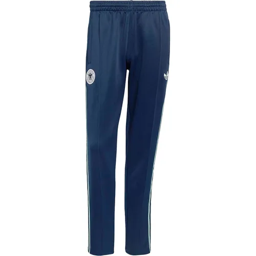 ADIDAS Herren Fanhose Deutschland Originals - Stylische Trainingshose für Herren, inspiriert vom deutschen Fußball. Bequem und mit regulärer Passform, ideal für den Alltag. Der Kordelzug sorgt für individuellen Tragekomfort. Ein Must-have für jeden adidas Fan!