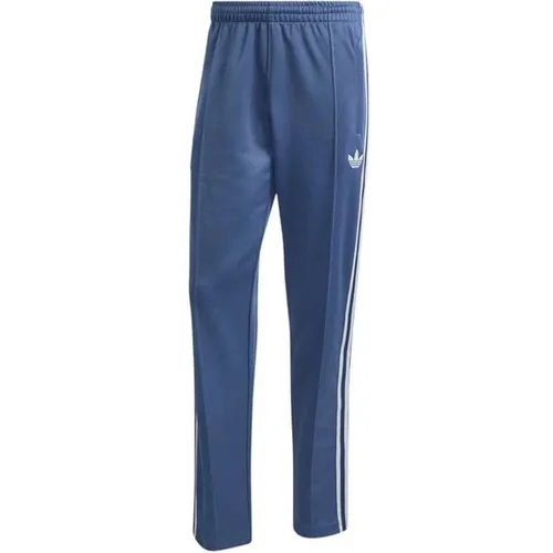 adidas Performance Trainingshose ITALIEN ORIGINALS blau L - Hochwertige Trainingshose aus recyceltem Polyester, ideal für Fußball und Freizeit. Bequemer Schnitt und Kordelverschluss sorgen für optimalen Tragekomfort.