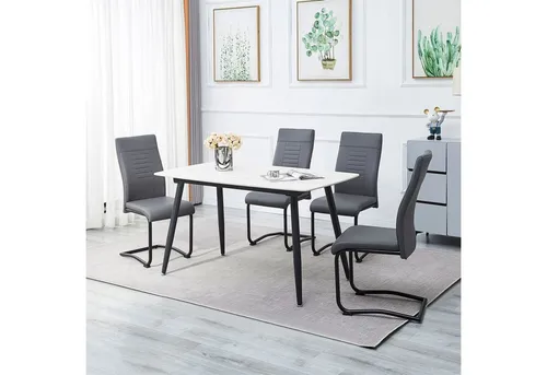 CARO-Möbel Esszimmerstuhl LOANO (4 St), eleganter Küchenstuhl mit Metallgestell - Der Esszimmerstuhl Loano vereint modernen Stil mit hohem Sitzkomfort. Die gepolsterte Kunstleder-Oberfläche in Grau und das stabile Metallgestell bieten eine ansprechende Optik und langlebige Qualität für gesellige Abende.