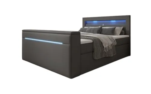 Luxusbetten24 Boxspringbett Repos 180x200 Doppelbett Polsterbett Bett mit TV Lift, USB und LED | Bezug: Kunstleder | Farbe: Grau | Härtegrad: H3 (70-100kg)