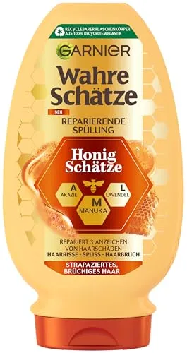 Garnier Wahre Schätze Reparierende Spülung Honig Schätze 200 ml - Intensive Pflege für strapaziertes Haar mit reparierendem Akazienhonig und Bienenwachs. Die pflegende Formel kräftigt das Haar und reduziert Haarbruch. Nachhaltig und recycelbar.