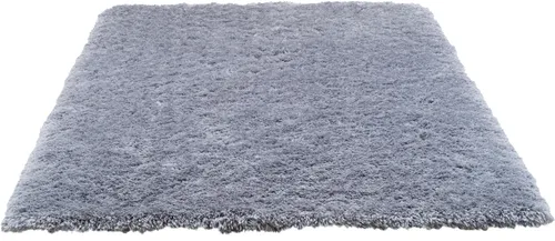 Hochflor-Teppich TOM TAILOR HOME "Flocatic" in Grau – 70cm x 140cm - Der stilvolle Hochflor-Teppich "Flocatic" von TOM TAILOR HOME setzt Akzente in jedem Wohnraum. Mit seinem dichten, weichen Flor und hochwertiger Verarbeitung sorgt er für gemütliche Atmosphäre und ist in verschiedenen Farben erhältlich.