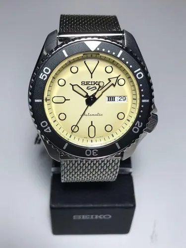 Seiko 5 SRPD67K1 - Sport Automatik Uhr mit Edelstahl-Milanaiseband - Die Seiko 5 SRPD67K1 ist eine stilvolle Automatik-Uhr mit präzisem Kaliber 4R36. Ihr elegantes Edelstahl-Milanaiseband und das ansprechende Design machen sie zum perfekten Begleiter für jeden Anlass.