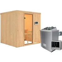 Woodfeeling Sauna Tromsö mit 9 kW Ofen und Glastür - Genießen Sie die wohlige Wärme der Woodfeeling Sauna Tromsö mit 9 kW Saunaofen und externer Steuerung. Hochwertige Materialien, optimale Wärmeisolierung und umfangreiches Zubehör für ein perfektes Saunaerlebnis zu Hause.
