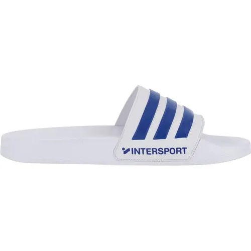 ADIDAS Herren Badeslipper Shower adilette – Komfortabel und stylisch - Ideal für Schwimmbad, Umkleide oder zu Hause – die adilette bietet leichten Tragekomfort und sportliches Design mit adidas Logo und 3-Streifen. Perfekt für jeden Tag!