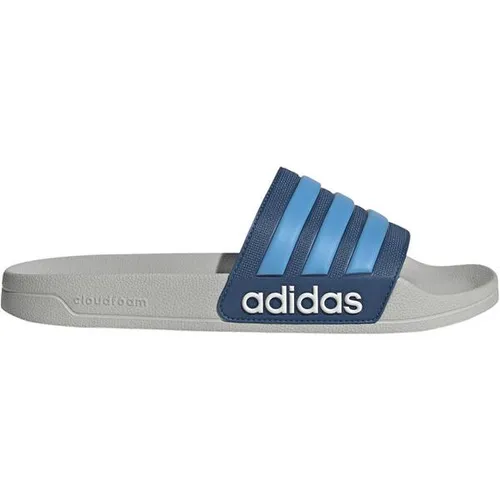 ADIDAS Herren Badeslipper Shower adilette - Bequeme Badeslipper für Schwimmbad, Umkleide oder Zuhause. Leicht und dämpfend für angenehmen Tragekomfort. Sportlicher Style mit adidas Logo und 3-Streifen.