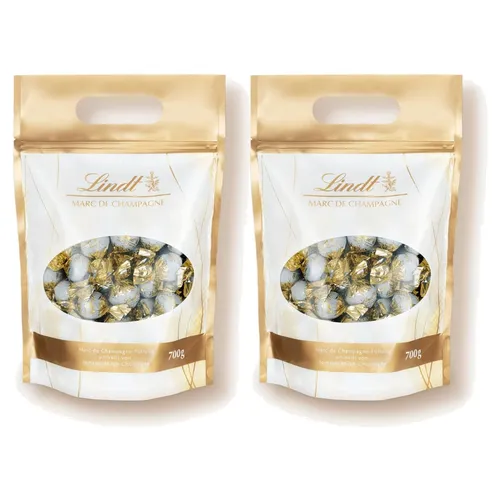 LINDT Marc de Champagne Kugeln 2x700 g - Genießen Sie die exquisiten Schokoladenkugeln von Lindt mit dem feinen Geschmack von Marc de Champagne. Ideal zum Teilen und für besondere Anlässe. Perfekt für Schokoladenliebhaber!