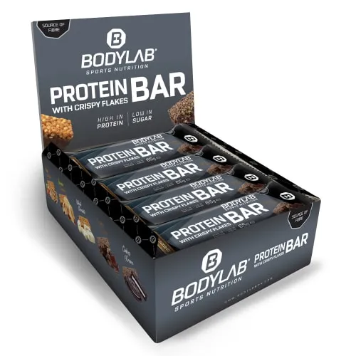 Bodylab24 Protein Bar Crispy Schokolade - Proteinriegel mit 27g hochwertigem Whey Protein pro Riegel, ideal für Sportler und unterwegs. Fettarm und lecker mit knusprigen Flakes und Schokoladenglasur.