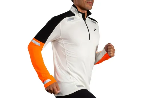 BROOKS Herren T-Shirt Run Visible 1/2 Zip 2.0 - Langarmshirt mit geringem Gewicht, zusätzlicher Wärme und reflektierenden Elementen für optimale Sichtbarkeit im Dunkeln - ideal für Läufer und aktive Sportler.