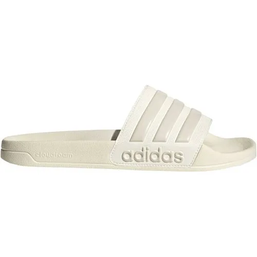 ADIDAS Herren Badeslipper Shower adilette – Bequeme Freizeit-Sandalen - Die ADIDAS Shower adilette bietet optimalen Komfort für Schwimmbad, Umkleide und Zuhause. Leicht und dämpfend, kombiniert sie sportlichen Stil mit einem angenehmen Tragegefühl.