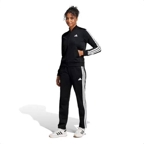 ADIDAS Damen Sportanzug Essentials 3-Streifen - Trainingsanzüge, sportlicher Look mit 100% recycelten Materialien für nachhaltigen Style und reduzierten CO2-Fußabdruck.