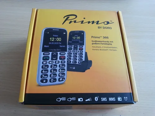 Primo 366 by Doro Großtastenhandy silber mit Tischladestation - ideal für Senioren, beleuchtetes Farbdisplay, Notruftaste und FM Radio