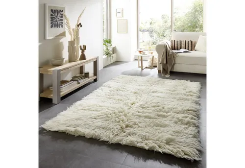 Wollteppich THEKO "Flokos 2", beige, Ø 120 cm - Handgewebter Wollteppich in Beige, Durchmesser 120 cm, Höhe 70 mm. Kuschelig weich und pflegeleicht – ideal für ein warmes Wohnambiente.