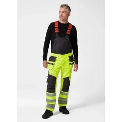 Helly Hansen Alna 2.0 Construction Latzhose - Latzhose für optimale Bewegungsfreiheit und Sichtbarkeit, ausgestattet mit Stretch-Stoff und speziellen Reflexstreifen für Sicherheit bei der Arbeit.