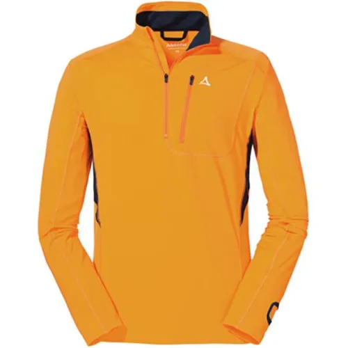 SCHÖFFEL Herren Rolli Longsleeve Berwang M - Funktionales Rolli Longsleeve für Skitouren, mit 4-Wege-Stretch für maximale Bewegungsfreiheit und geruchshemmendem Material aus recyceltem Kaffeesatz. Praktische Brusttasche und Öffnung für Multisport-Uhr.
