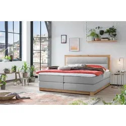 Belanoti Age Boxspringbett 180x200 mit Eiche - Hochwertiges Boxspringbett 180x200 mit 7-Zonen Taschenfederkern und Visco Topper für optimalen Liegekomfort. Massivholz Eiche sorgt für Stabilität und Langlebigkeit. Ideal für erholsame Nächte.