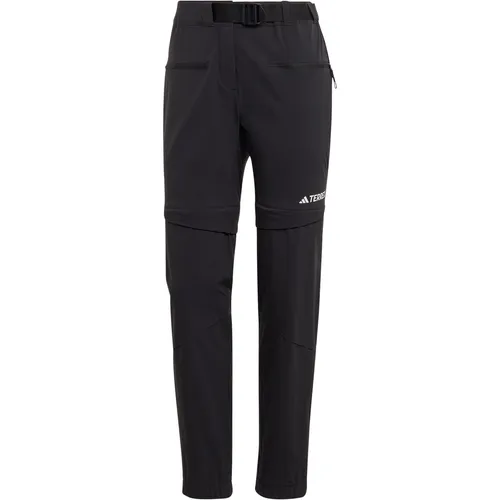adidas Terrex Utilitas Hiking Zip Off Pants schwarz (095A) 42 - Wanderhosen für Damen mit abtrennbaren Beinen, ideal für wechselnde Wetterbedingungen, aus 89 % recyceltem Nylon, wasserabweisend und schnell trocknend.