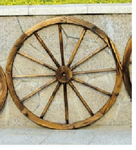 HTI-Line Gartenfigur Wagenrad Sommerset - Rustikale Gartendekoration, ideal als Wanddeko oder zwischen Blumen. Mit einem Durchmesser von 55 cm setzt es charmante Akzente im Garten.