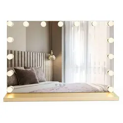 REA Hollywood LED Spiegel Gold - Der REA Hollywood LED Spiegel in Gold kombiniert elegantes Design mit praktischer Funktionalität. Die dimmbare Beleuchtung und Farbtemperaturregelung sorgen für optimale Lichtverhältnisse beim Schminken und setzen stilvolle Akzente in jedem Raum.