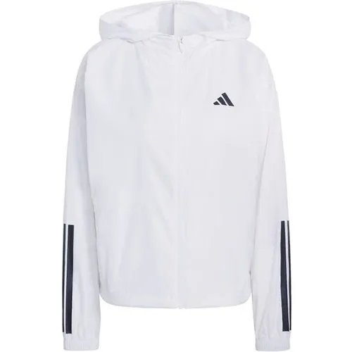 ADIDAS Damen Schlupfjacke Hyperglam 3-Streifen Windbreaker - Stilvolle Windjacke für aktive Frauen. Der Hyperglam Windbreaker bietet wind- und wasserabweisenden Schutz, eine lockere Passform und praktische Taschen – ideal für sportliche Aktivitäten und Freizeit.