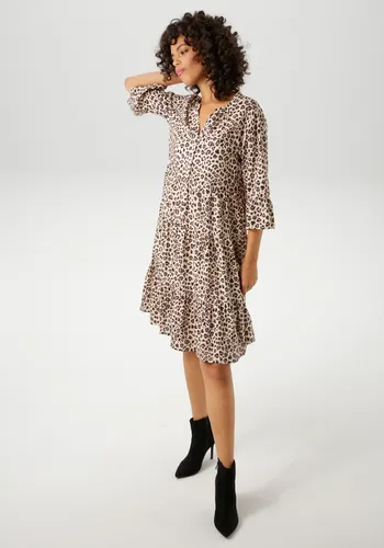 Tunikakleid mit extravagantem Animal-Print - NEUE KOLLEKTION, Gr. 46 - Sommerkleider in hellbeige-schwarz-hellbraun, aus weich fallender Viskose mit dekorativem V-Ausschnitt und Volant-Details für einen lässigen, eleganten Look.