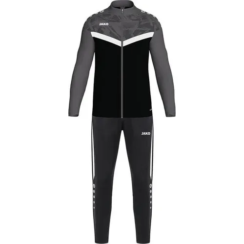 JAKO Kinder Polyesteranzug Iconic - Sportjacke aus 100% recyceltem Polyester, mit Jacquard-Einsatz und praktischen Seitentaschen mit Reißverschluss für aktive Kinder.