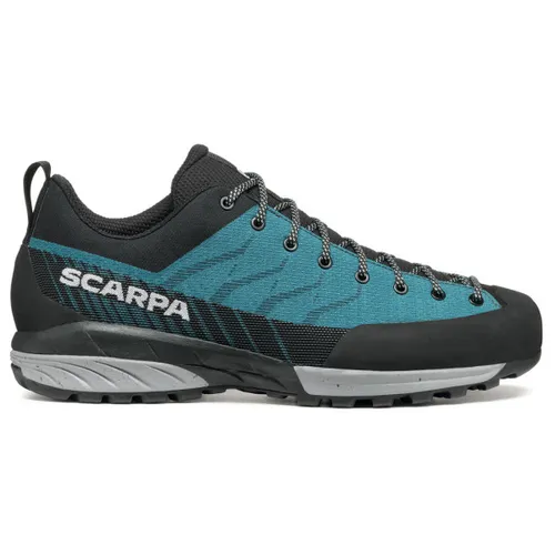 Scarpa Mescalito Planet Herren Wanderschuh in Blau, Größe 46.5 - Der Scarpa Mescalito Planet bietet innovative Materialien für höchsten Tragekomfort. Mit einer leichten, atmungsaktiven Konstruktion und recycelten Komponenten eignet er sich ideal für anspruchsvolle Outdoor-Abenteuer.