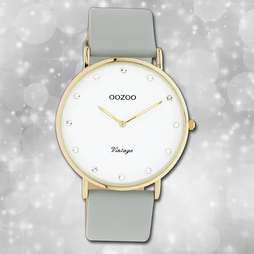 Oozoo Vintage Series C20245 - Elegante graue Lederuhr - Elegante Analog Quarzuhr der Marke Oozoo mit einem stilvollen grauen Lederarmband und goldfarbenem Gehäuse. Ideal für Damen, die Wert auf modisches Design legen. Wasserdicht bis 3 bar.