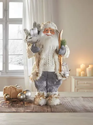 Dekoleidenschaft Dekofigur Winter 46 cm hoch, Weihnachtsmann aus Textil mit Kunstfell, Nikolaus mit Laterne, Ski & Geschenke-Sack, Santa Claus Figur, Christkind, Weihnachtsmannfigur, Nikolausfigur
