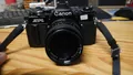 Foto Kamera Canon AV-1 mit Objektiv Super Albinar MC 1:2.8 f=28mm Schwarz