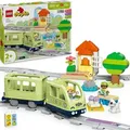 LEGO DUPLO Interaktive Abenteuer-Eisenbahn - Lernspielzeug für Kleinkinder ab 2 Jahren – 14 Gleisstücke, Aktionssteine mit Geräuschen und 4 Sp... - Bunt