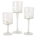 BOLTZE 3tlg Set Windlicht Nordy I klar mit Häusern & Herzen in Weiß I Höhe 20cm, 25cm & 30cm I Teelichthalter auf Fuß I Tisch-Deko, Herbst, Winter I Kerzenständer aus Glas, Kerzenhalter