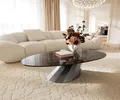 DELIFE Couchtisch Edge Oval 140x75 cm Keramik Emperador Extra Lucidato Dunkelbraun Parabi Metallic Silber