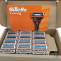 Gillette Fusion5 12 Ersatzklingen, mit Gleitstreifen. 1×Schutzkappe fehlt.