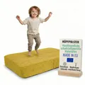Pillows24 – Hüpfpolster für Kinder Indoor | Hüpfkissen 70x110x17 cm mit Federn & Schaumstoff | Kindertrampolin für Zuhause | Hüpfmatte mit abnehmbarem Cordbezug | Trampolin Indoor Kinder | Gelb