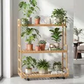 Mendler Bambus Pflanzenregal HWC-Q33, Blumentreppe Blumenständer Pflanzentreppe, 3 Ablagen Rollen 105x90x38cm - Natur