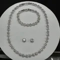 Neu Swarovski Angelic Halskette Kette Armband Ohrringe Damen Rund Anzug Weiß DE