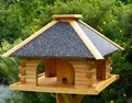 DSH DEKO SHOP HANNUSCH Vogelhaus Futterhaus mit Strukturputzdach, Ständer und Solar wählbar