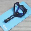Tacx Ciro Flaschenhalter - schwarz matt blau - Carbon mit Fiberglas
