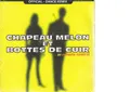 Chapeau Melon Et Bottes De Cuir