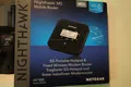 Netgear Nighthawk MR5200 WIFI 6 Dualbandrouter - Schwarz Händler