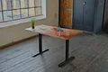 KAWOLA Schreibtisch LORA elektrisch höhenverstellbarer Schreibtisch 180x90cm mit Baumkante Nussbaumfarben massiv