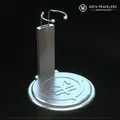 Legendärer Actionfigurenständer mit Metatravelers-Logo Metatravelers
